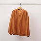Blusa testurizzata con bottoni e scollo a V