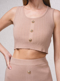 Top corto in maglia a costine con bottoni