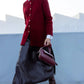 Cardigan lungo bordeaux con bottoni dorati
