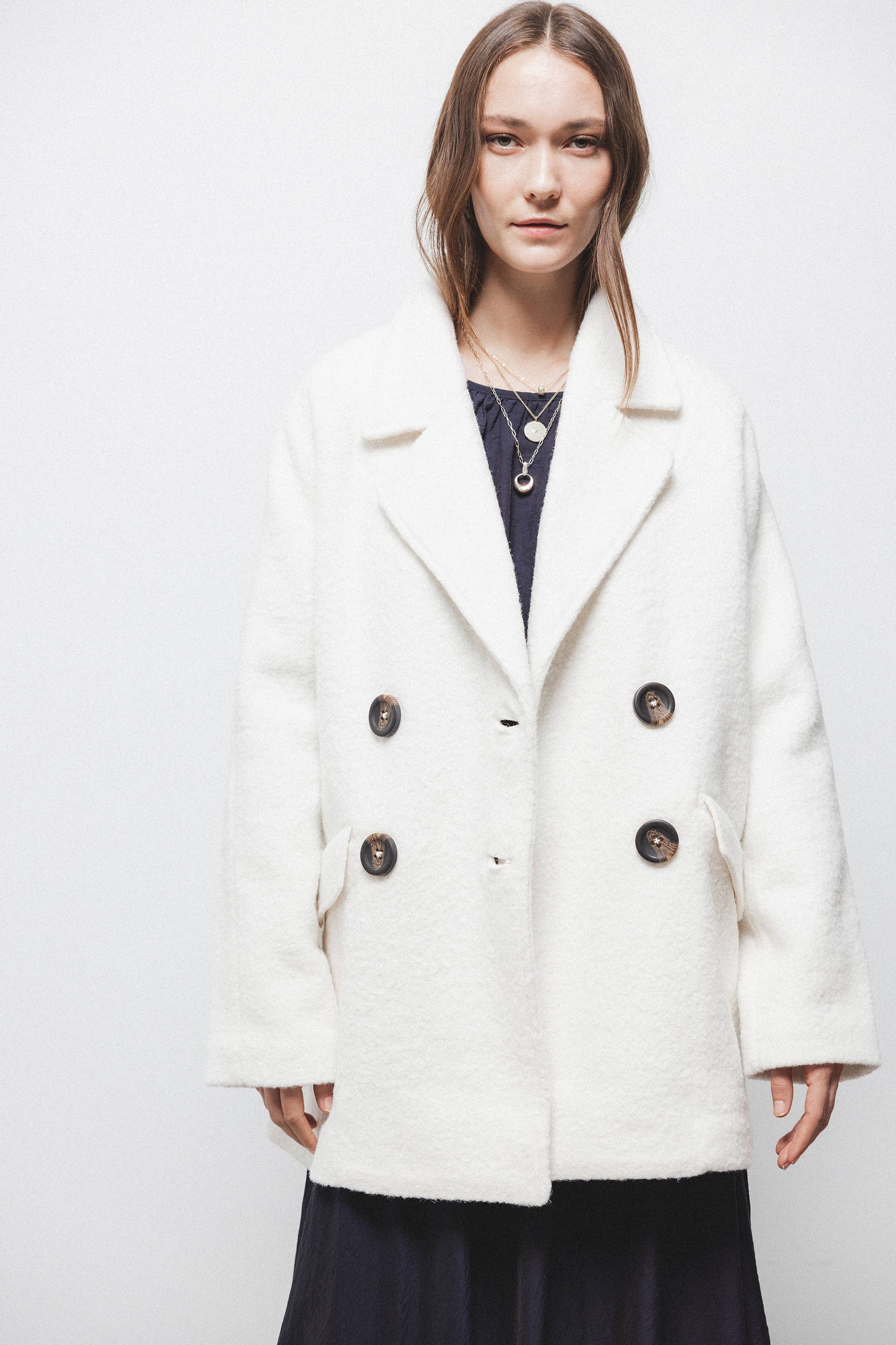 Cappotto doppiopetto minimal in bouclé