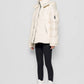 Piumino in eco shearling con cappuccio removibile