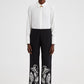 Pantaloni in crêpe neri con ricami