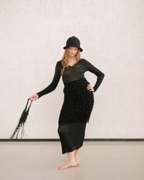 Top a coste con scollo a V in filato glitter
