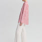 Camicia a righe rosse con bottoni a vista
