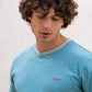T-shirt vintage verde in cotone biologico con logo ricamato