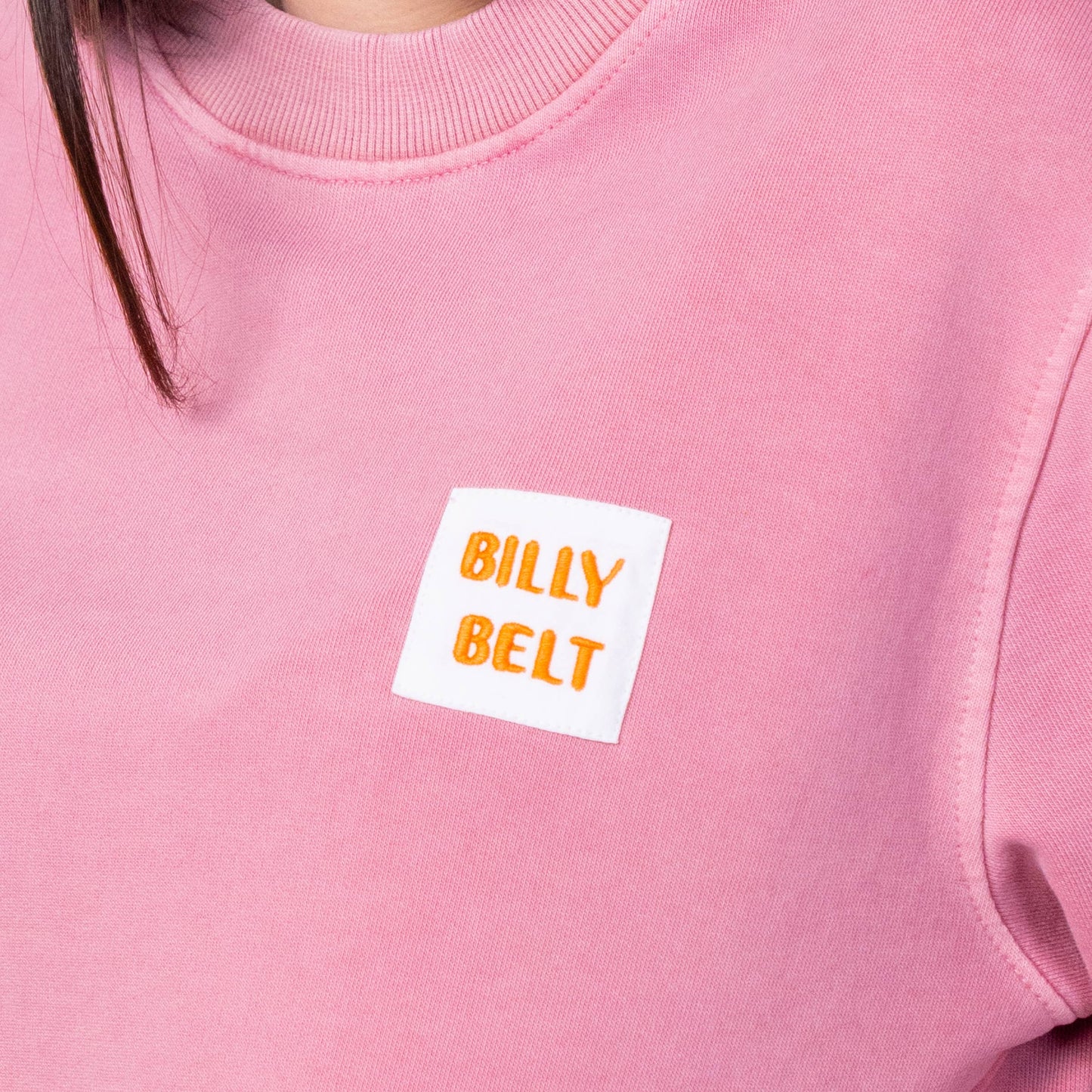 Felpa unisex rosa in cotone biologico con patch logo
