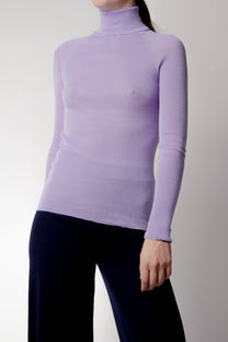 Top in maglia rasata con scollo rotondo e bordi a contrasto