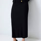 Set in maglia a coste con cardigan e gonna lunga nera