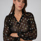 Blusa Souella nera in tessuto velato con paillettes multicolor