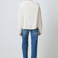 Cardigan in maglia crema con tasche e bottoni