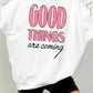 Felpa oversize con stampa “Good Things Are Coming”