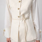 Gilet aderente crema con bottoni dorati