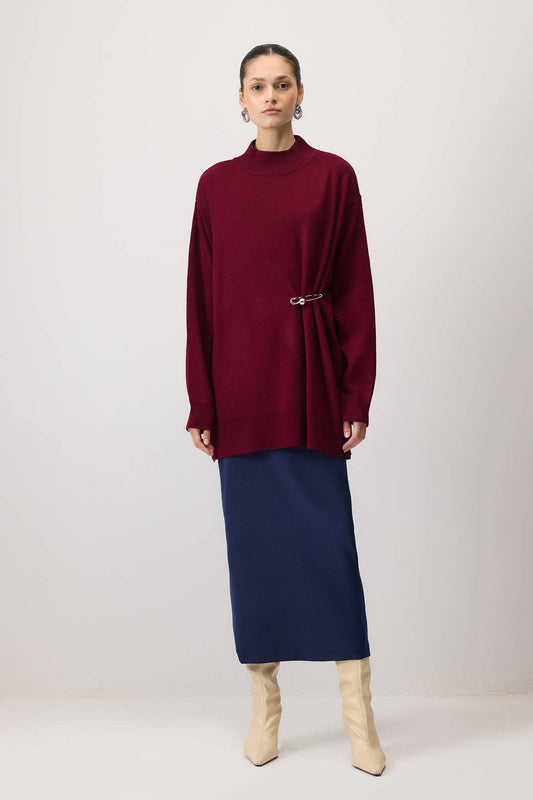 Tunica in maglia oversize con accessorio metallico