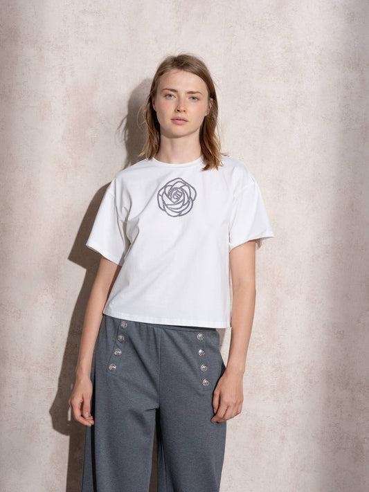 T-shirt bianca con applicazione lucida