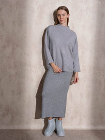 Maglione in maglia con motivo a pois e bottoni ai polsi