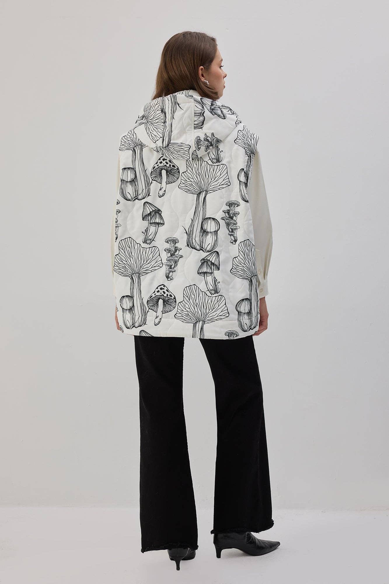 Gilet imbottito con cappuccio
