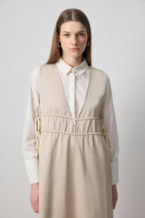 Abito lungo con scollo a V e coulisse laterali