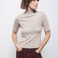 Maglione dolcevita a maniche tre quarti in maglia rasata