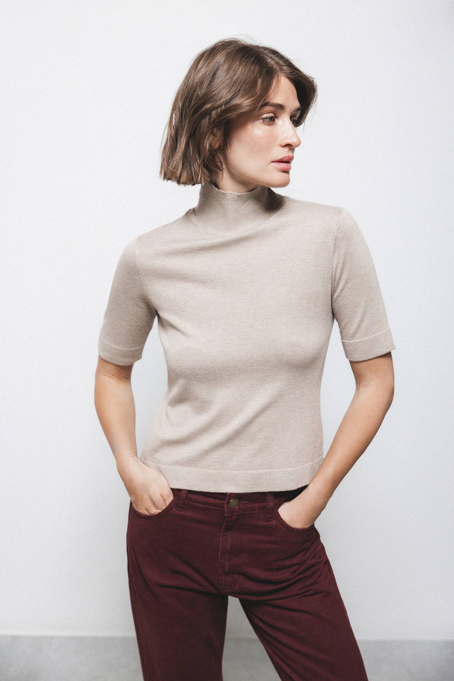 Maglione dolcevita a maniche tre quarti in maglia rasata