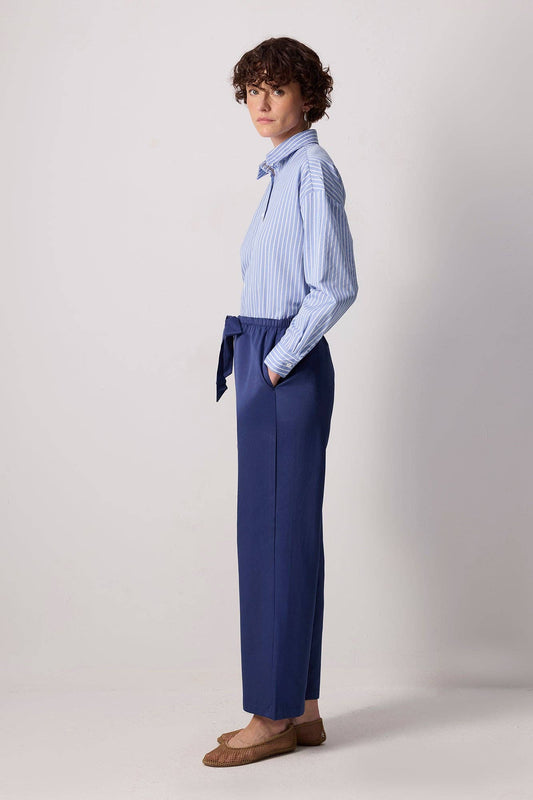 Pantaloni a gamba larga con cintura a fascia in misto cotone