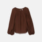 Blusa effetto stropicciato con maniche a palloncino