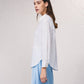 Camicetta oversize con bottoni frontali e colletto classico