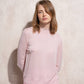Maglione in maglia con collo alto e volant