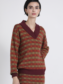 Set maglia in maglia con scollo a V e gonna midi coordinata