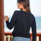 Maglia traforata con scollo a V