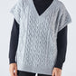 Gilet in maglia a trecce con scollo a V