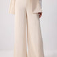 Completo elegante con gilet doppiopetto e pantaloni palazzo