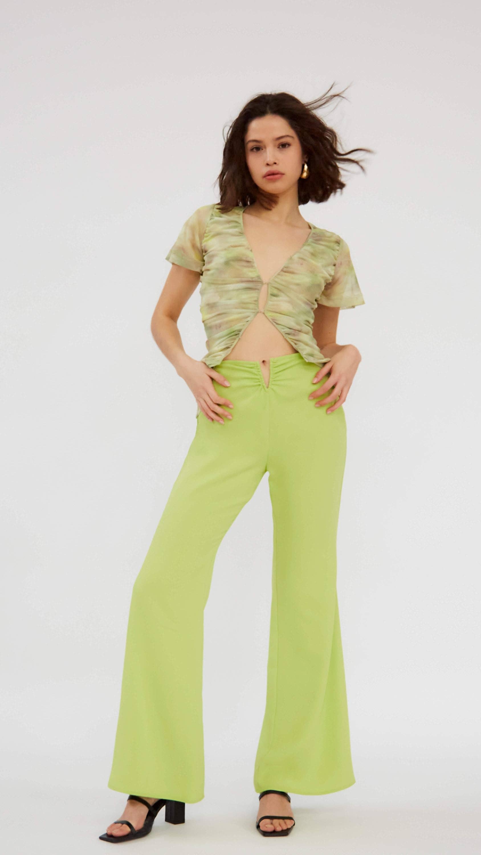 Pantaloni a zampa lime a vita alta