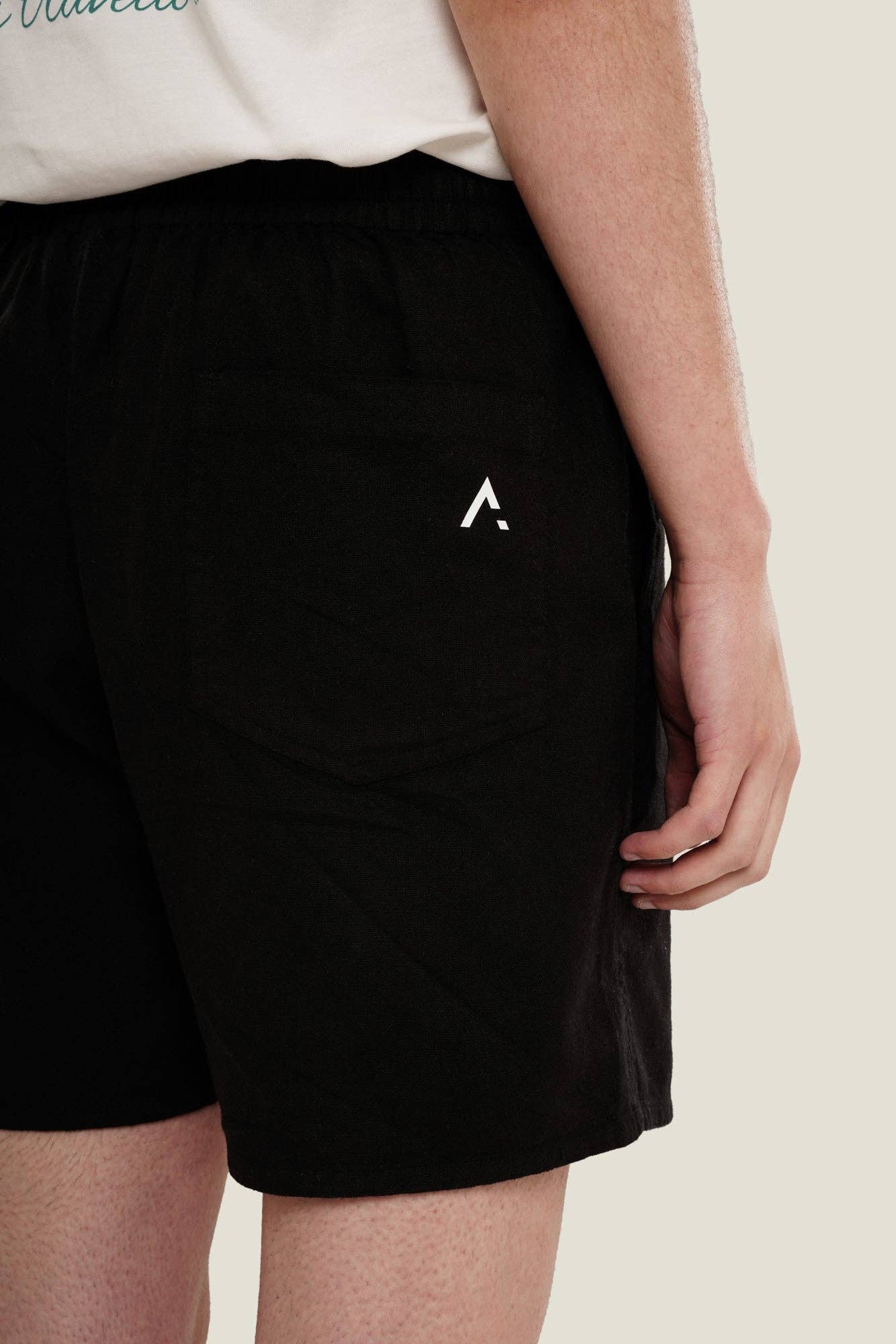 Pantaloncini neri in cotone e lino con vita elastica