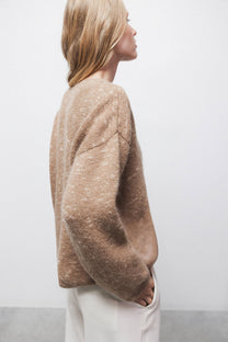 Maglione in maglia rasata con scollo a V