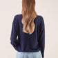 Maglia in viscosa con scollo a V e micro fantasia