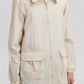 Impermeabile beige con tasche applicate