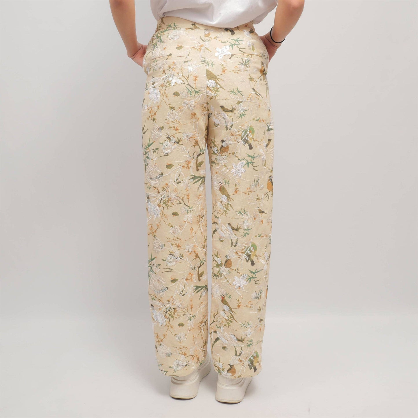 Pantaloni wide leg con ricamo floreale e paillettes