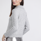 Polo in maglia con maniche a treccia
