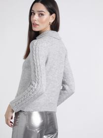 Polo in maglia con maniche a treccia
