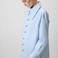 Camicia oversize azzurra con bottoni in metallo