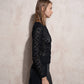 Blusa in pizzo elasticizzato