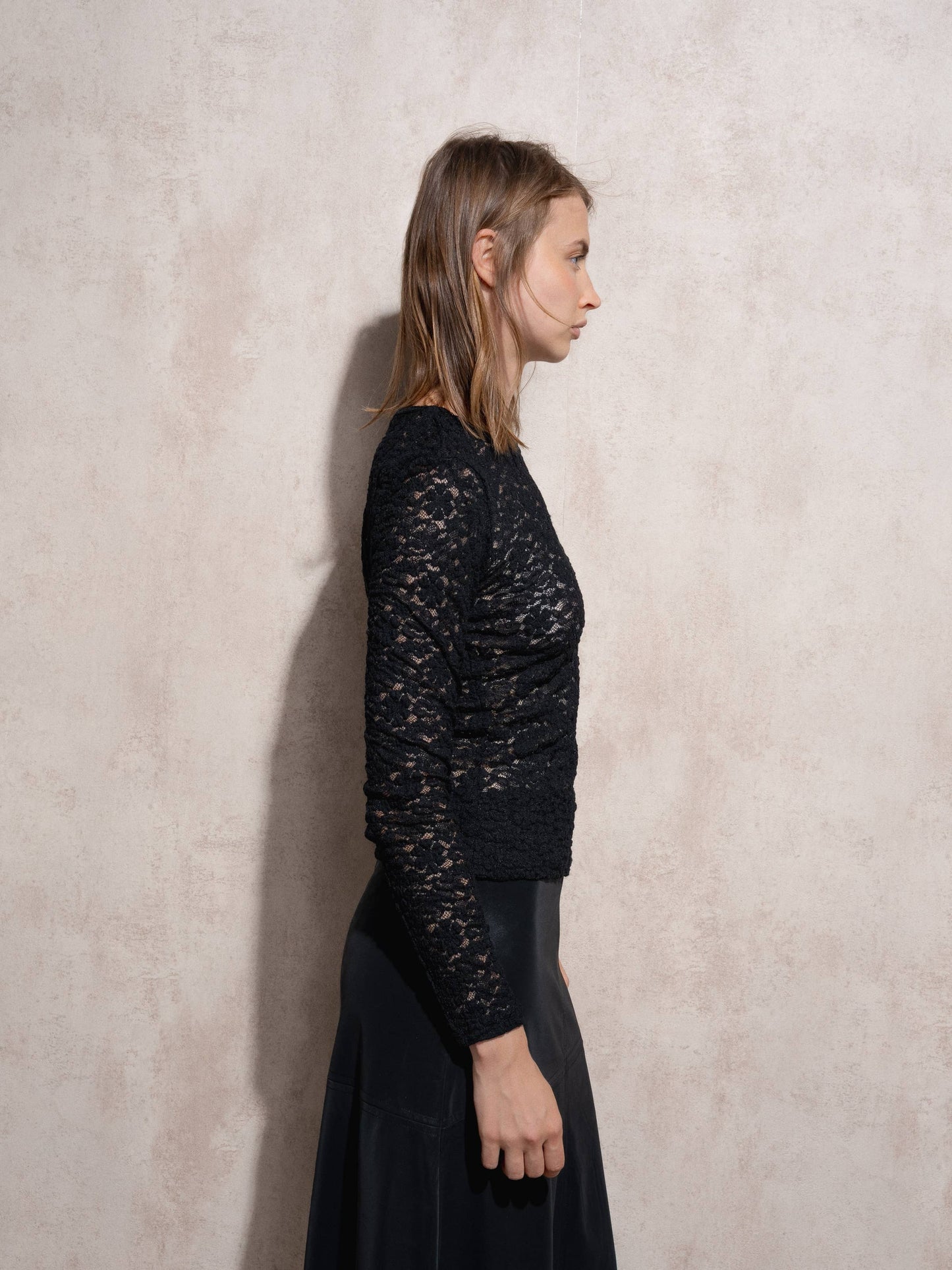 Blusa in pizzo elasticizzato