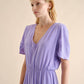 Abito midi in lino con balze e scollo a V