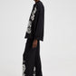 Bomber oversize nero ricamato con motivo floreale