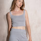 Top cropped in maglia con glitter