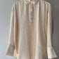 Tunica melange beige con colletto a camicia