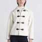 Cappotto corto teddy con chiusure a gancio