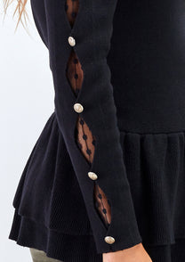 Maglia peplum con inserti in pizzo e bottoni