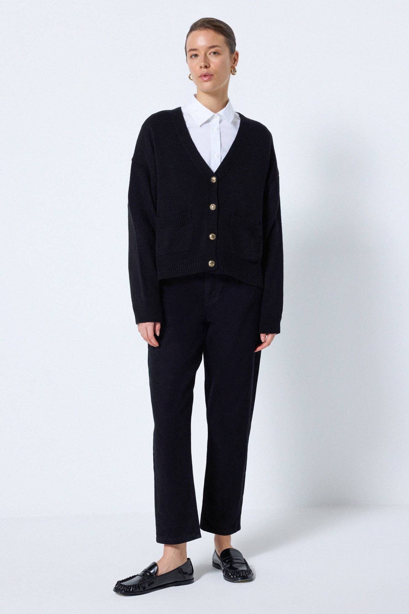 Cardigan in maglia nero con bottoni e tasche