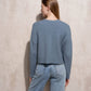 Cardigan corto in maglia con scollo a V e tasche